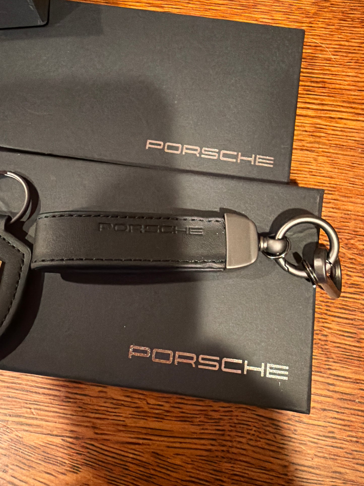 Porsche Crest Dual Leather keychain Black